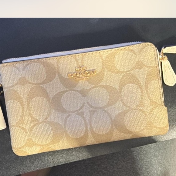 Coach Handbags - Coach Tan Wristlet with Signature Pattern